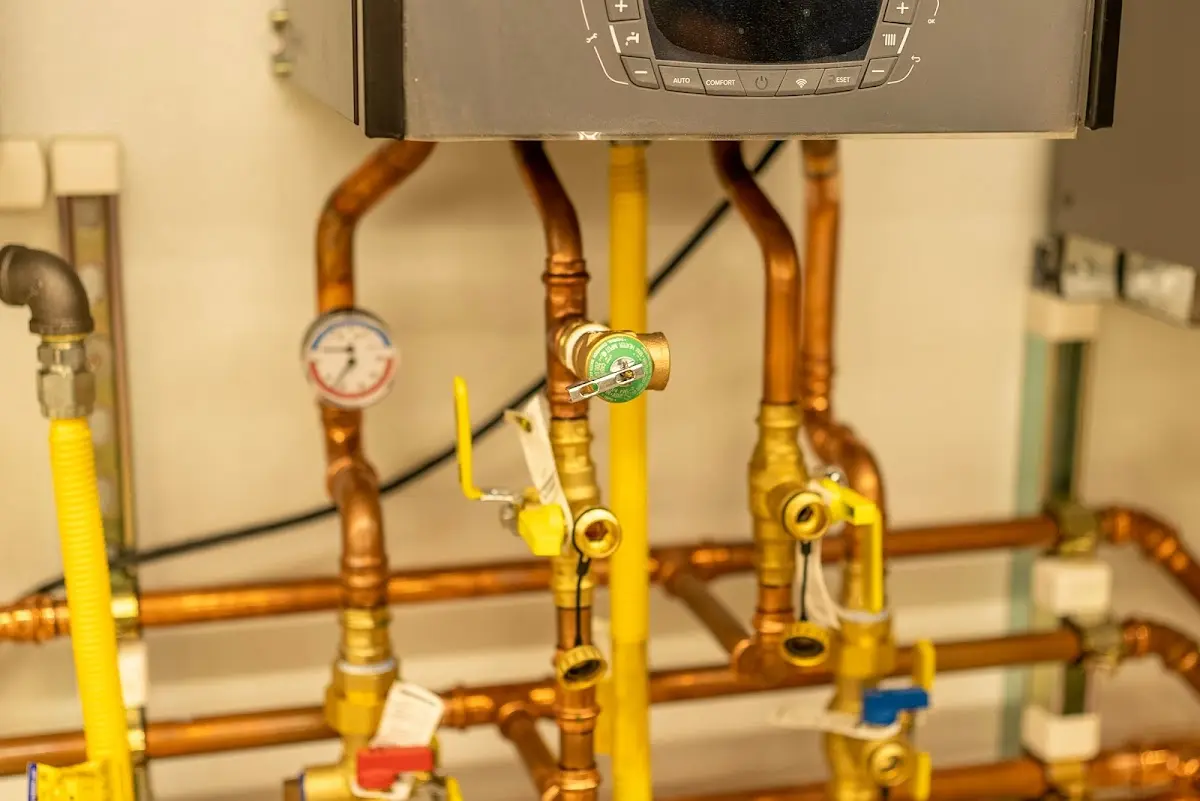 Licensed technician providing Water Heater Installation for a homeowner in Port Jefferson